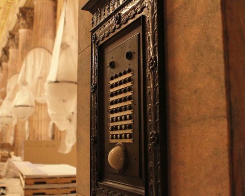 On the stairs to the Vault, you'll see a vintage teller call button panel